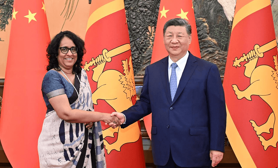 Prime Minister meets with the President of the Peoples Republic of China in Beijing.